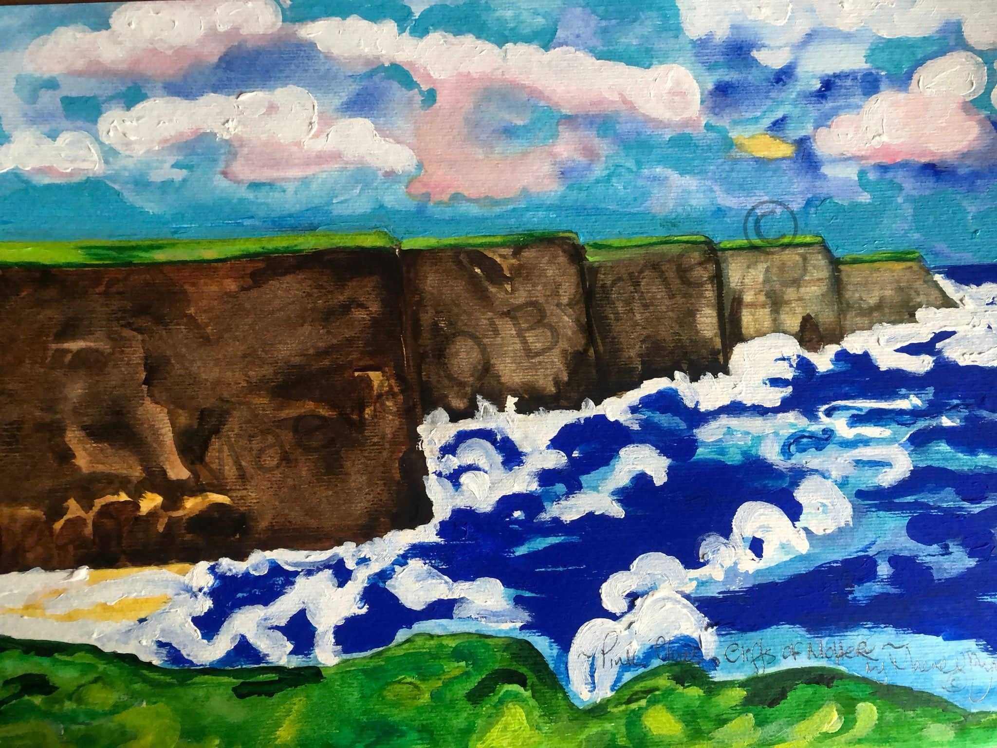 Pink clouds over the cliffs of Moher